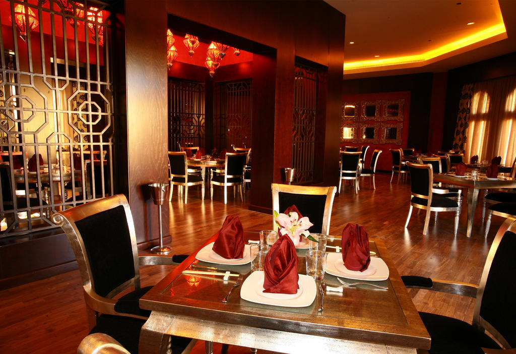 Miramar Al Aqah Beach Resort Εξωτερικό φωτογραφία The interior of the restaurant